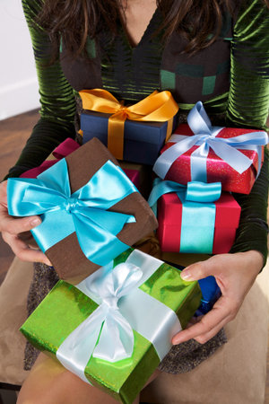 woman detail with a gift box in her hands
