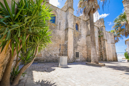 public street with water well and side of Church the Divine Savior, in Vejer de la Frontera (Cadiz, Andalusia, Spain, Europe)の写真素材