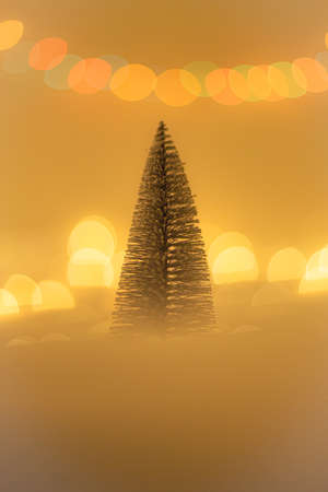 Christmas tree with bokeh lights in the background. Christmas and New Year concept.の写真素材
