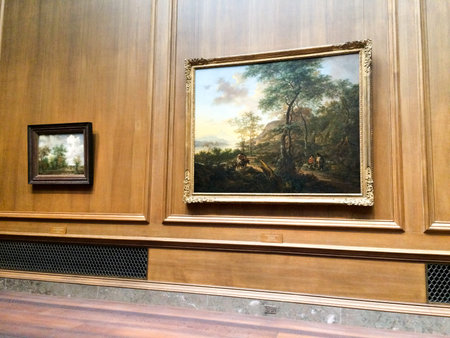 Relaxing in front of painting in a museum dutch landscape