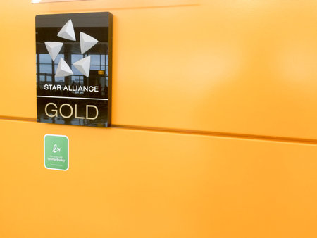 Star alliance airport lounge sign on yellow wall