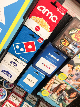 Gift cards on rack display in a store