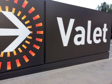 Valet parking sign big on ground entrance garage level outdoorの写真素材