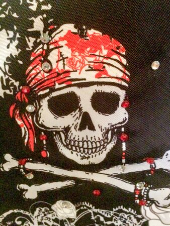 pirate flag jolly roger with skull and cross bonesの写真素材