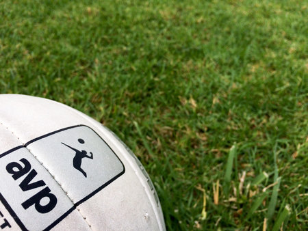 volleyball on green grass sport healthy activity design backgroundのeditorial素材