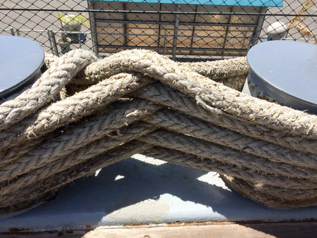 Rope large braided mooring line for ships boat background element on USS Iowa naval warship...