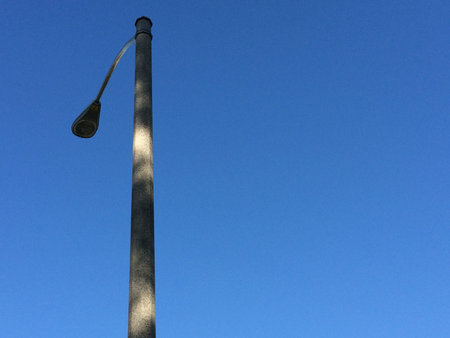 electric light pole concept background blue sky sunny day