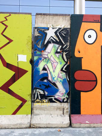 Urban street art on Berlin Wall section in california streetのeditorial素材