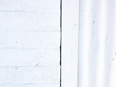White rustic abstract design background chipped paint flaking corrogated metal sheet
