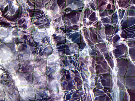 Abstract water reflections design element purple background sunlight