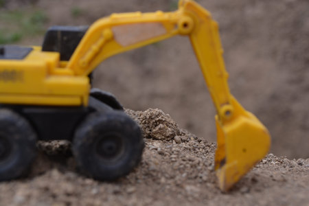 Exavator Digging in Dirt