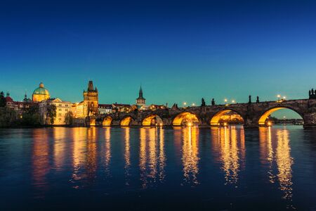 Pargue, view of the Lesser Bridge Tower of Charles Bridge at dusk.の写真素材