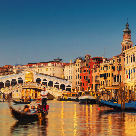Famous Grand Canal and Rialto Bridge at sunset, Venice, Italyの写真素材