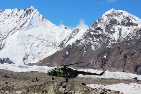Soviet helicopter with climbers landing at Khan Tengri and Pobeda Peak base camp  (Kyrgyzstan )のeditorial素材
