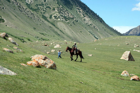 Kyrgyz horseman in Tien Shan mountainsのeditorial素材