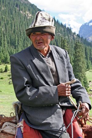 Kyrgyz horseman in Tien Shan mountainsのeditorial素材