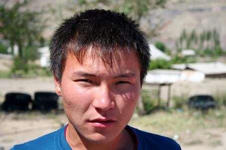 Kyrgyz Boy - road to Naryn, Kyrgyzstanのeditorial素材