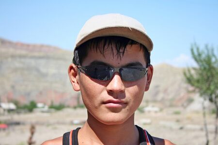 Kyrgyz Boy - road to Naryn, Kyrgyzstanのeditorial素材
