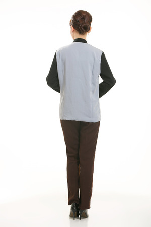 dressed in overalls who stand in front of a white backgroundの写真素材
