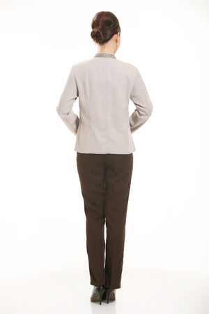 dressed in overalls who stand in front of a white backgroundの写真素材