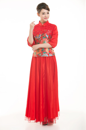 Wearing Chinese clothing waiter in front of a white backgroundの写真素材