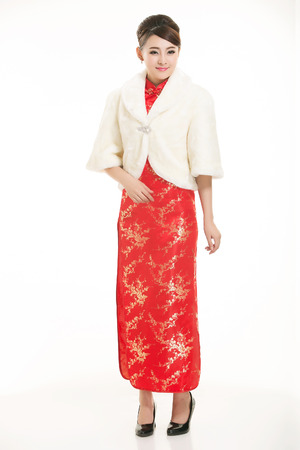 Wearing Chinese clothing waiter in front of a white backgroundの写真素材