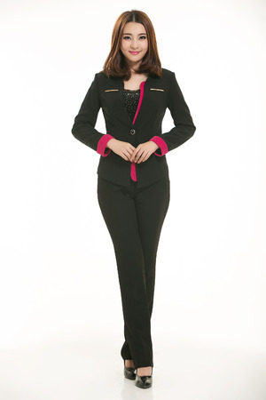 Young Asian women wearing a suit in front of a white backgroundの写真素材