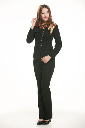 Young Asian women wearing a suit in front of a white backgroundの写真素材