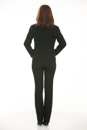 Young Asian women wearing a suit in front of a white backgroundの写真素材