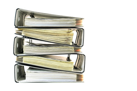 Pile of ring binders with documentsの写真素材