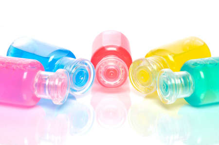Water colors in tiny bottles on white backgroundの写真素材