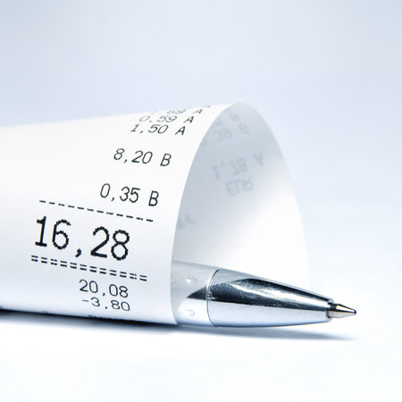 Supermarket receipt and ball penの写真素材