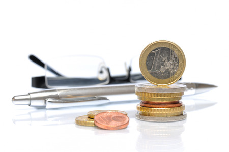 Business Still Life, money coins with ball pen and glasses の写真素材