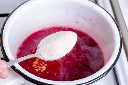 Strawberry jam makingの写真素材