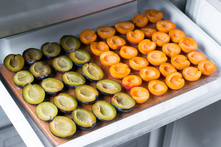 Frozen plums and apricotsの写真素材