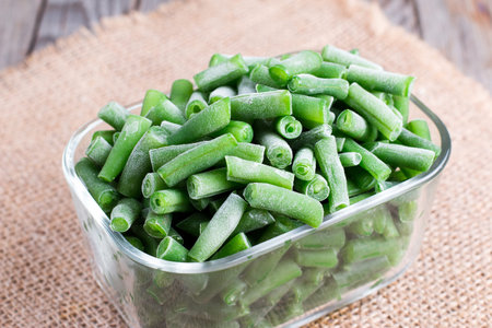 Frozen asparagus beans in a glass boxの写真素材