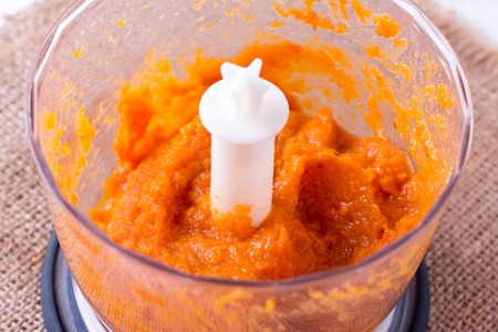 Blender with Pumpkin Puree. Cooking pumpkin puree in a blenderの写真素材
