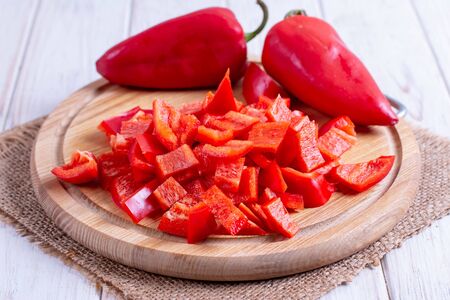 Sliced Sweet Fresh Red Peppers on a Cutting Boardの写真素材