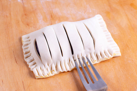 Cooking puff pastry with plums. Puff pastry with plums