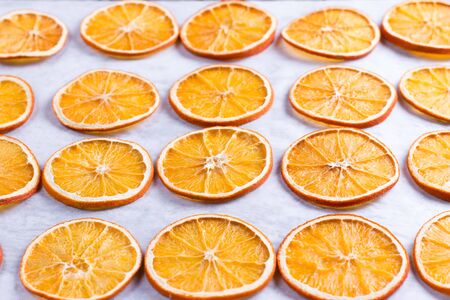 Dried Orange Slices on a white backgroundの写真素材