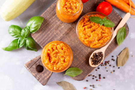 Squash puree (squash caviar) in a glass jar. Selective focus. Top viewの写真素材