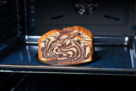 Homemade chocolate cake Zebra in the oven. Sweet pastries.の写真素材