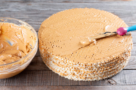 Step by step, making a waffle cake, with condensed milk, cocoa and butter. Homemade cake