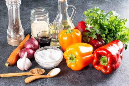 Ingredients for making a spicy salad with bell peppers, carrots, vegetables and sesame seeds. Step...