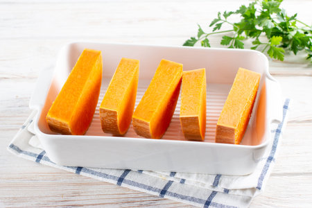 Raw pumpkin baking dish for pumpkin gnocchi. Step by step. Cookingの写真素材