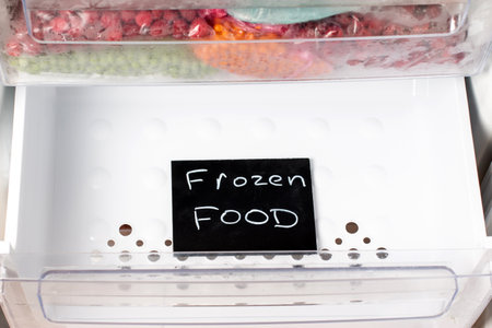Frozen Food. Empty freezer shelf. Food storage and ingredientsの写真素材