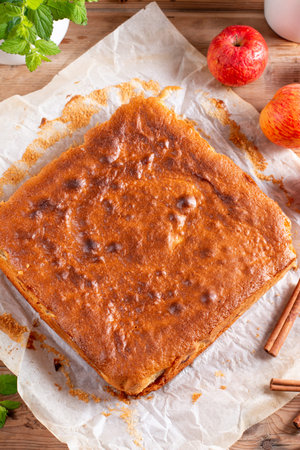 Classic sponge cake, selective focus. Homemade pie on rustic wooden background