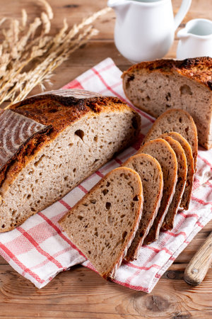 Delicious mixed rye bread on a cutting board, also called gray bread. Unleavened bread