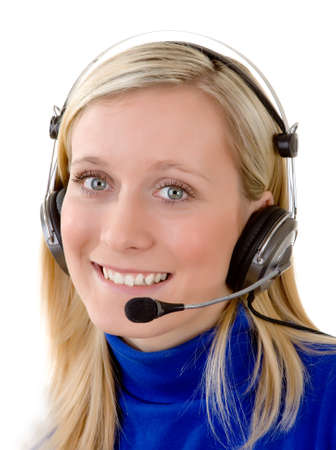 A professional young woman wearing a headset and glasses.の写真素材