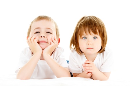 Cute brother and sister posing. の写真素材